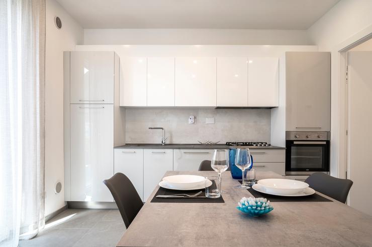 Küche und Wohnzimmer Wohnung Lentisco Villa Ari